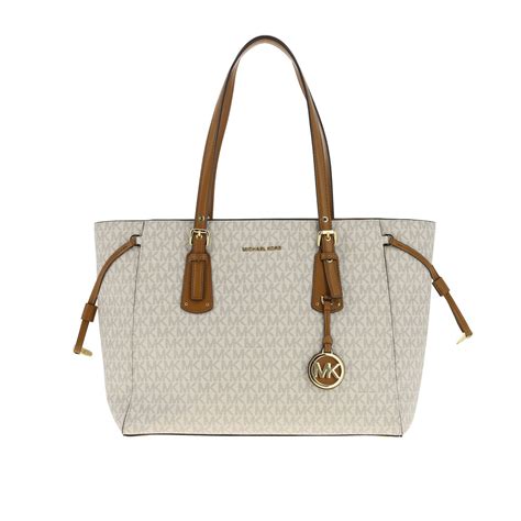 michael kors cream tan purse with chain|Michael Kors tan tote bag.